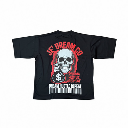 Back of  Black graphic streetwear shirt by Je’ Dream Co featuring “Turn Your Pain Into Hustle” slogan, bold skull biker design, red flame backdrop, oversized fit, and premium cotton fabric for edgy urban fashion and motivational style on a white background