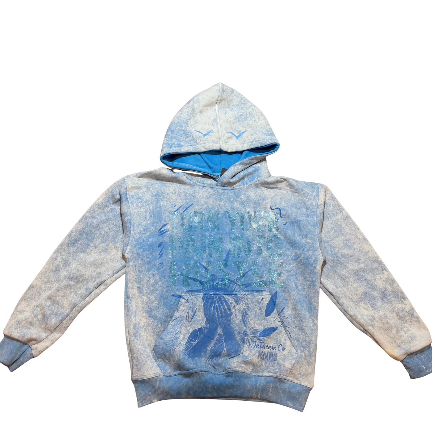 Light blue acid wash hoodie with blue rhinestones on front with Statue of Liberty face in white background 
