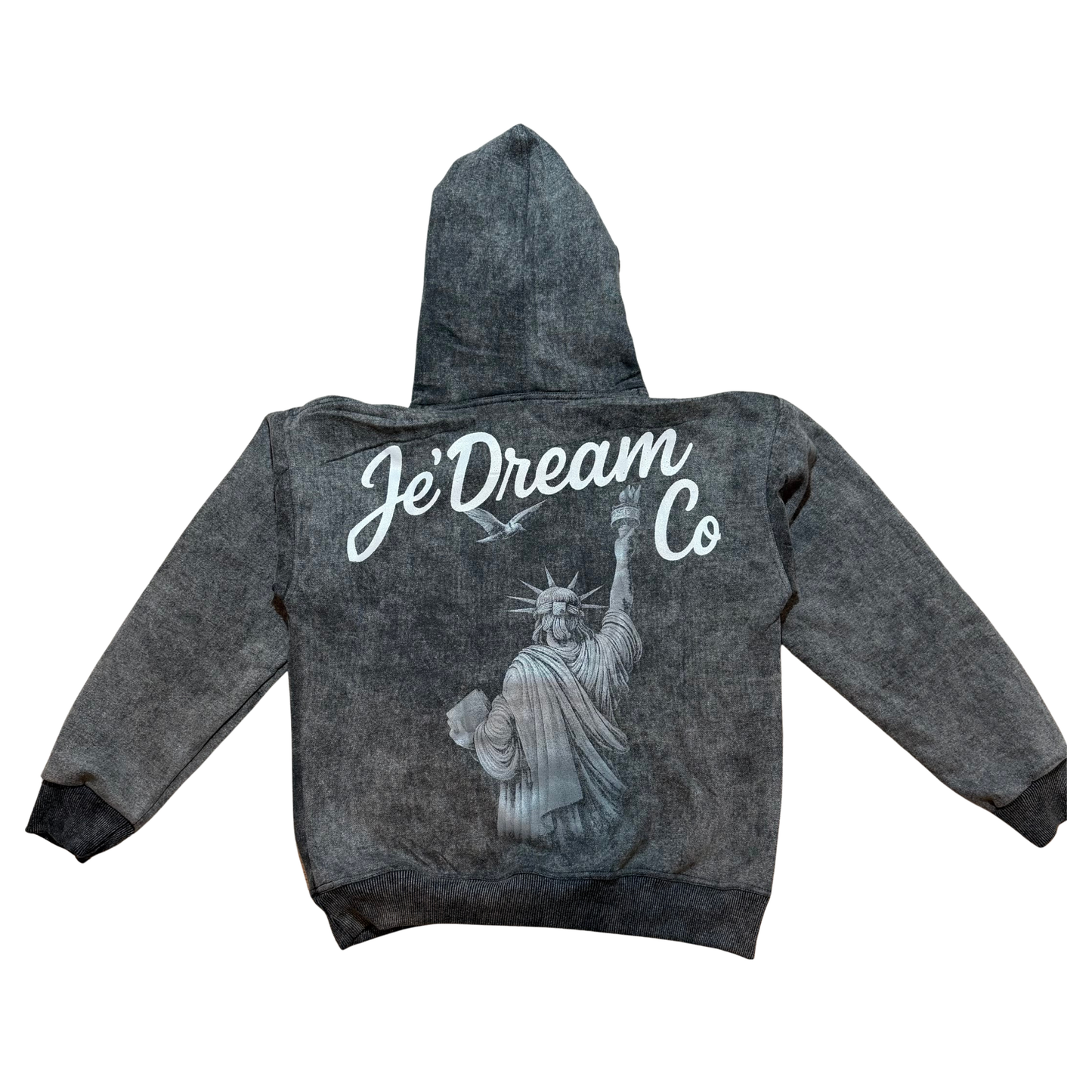 Black acid wash hoodie with je’ dream co on back and back view of Statue of Liberty in white background 