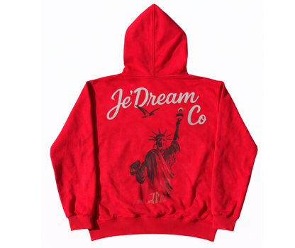 Red hoodie with 'JeDream Co' text and Statue of Liberty graphic on a white background